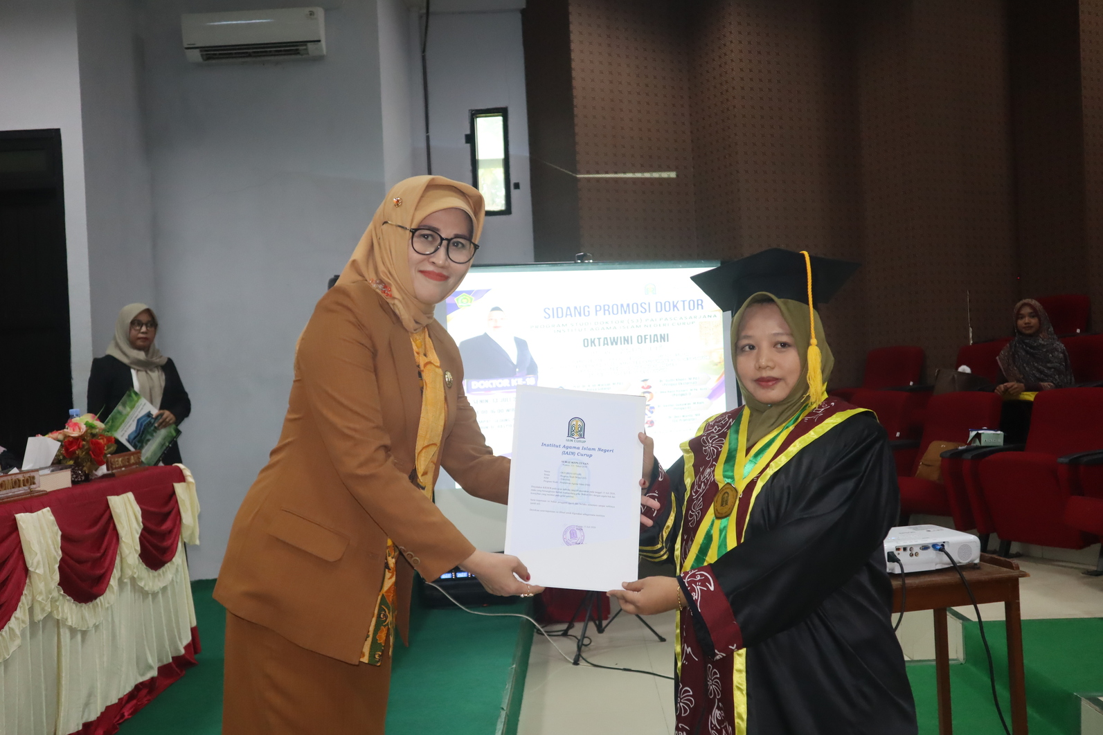 Serba serbi Ujian Terbuka Dr. Oktawini Ofiani